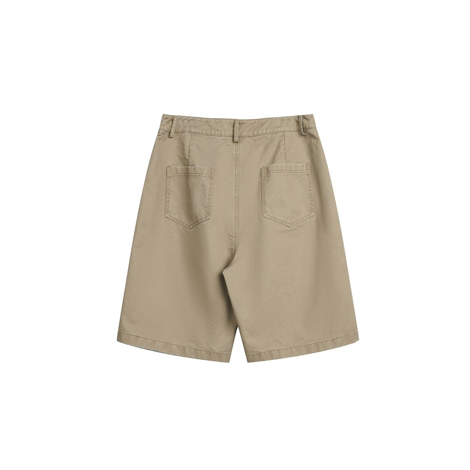 Back view of light tan shorts with belt loops and two rear patch pockets.