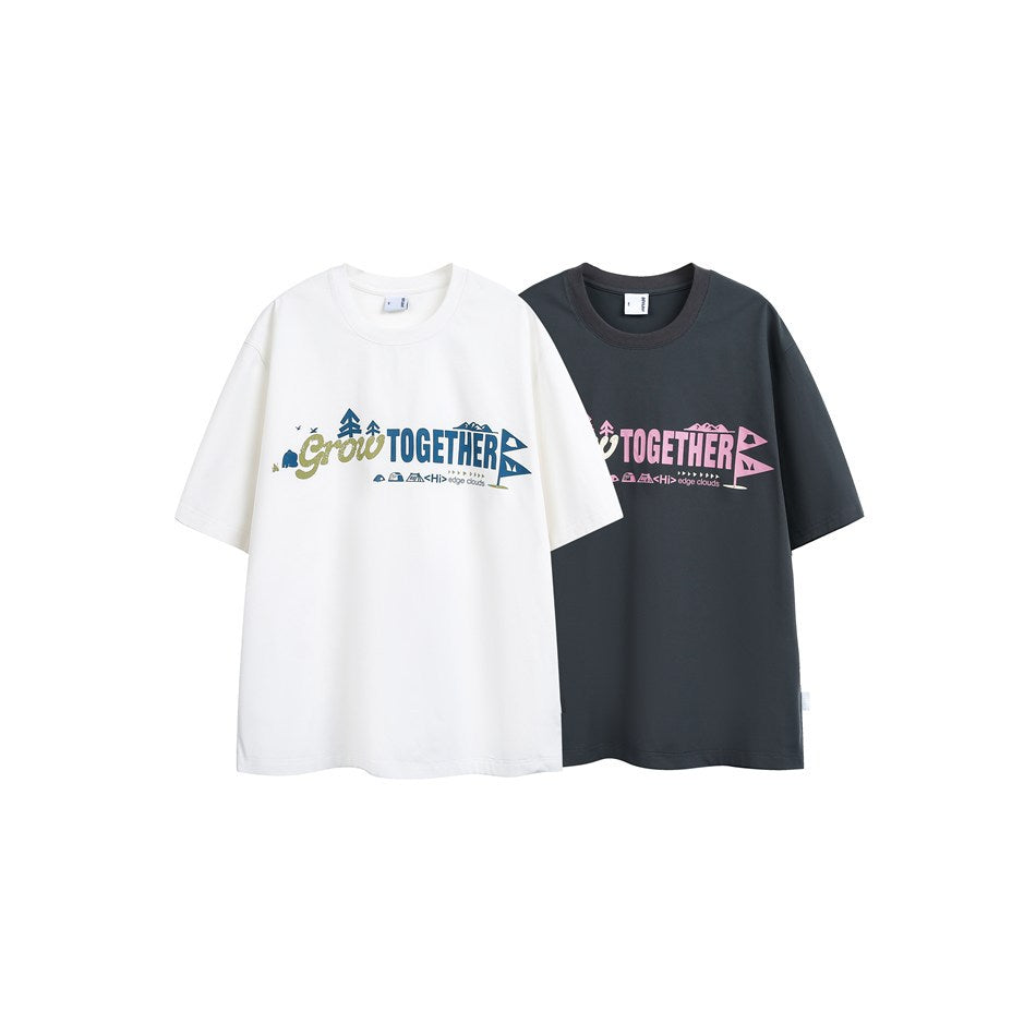 White and charcoal short-sleeve crew-neck T-shirts with colorful “Grow Together” chest graphics.