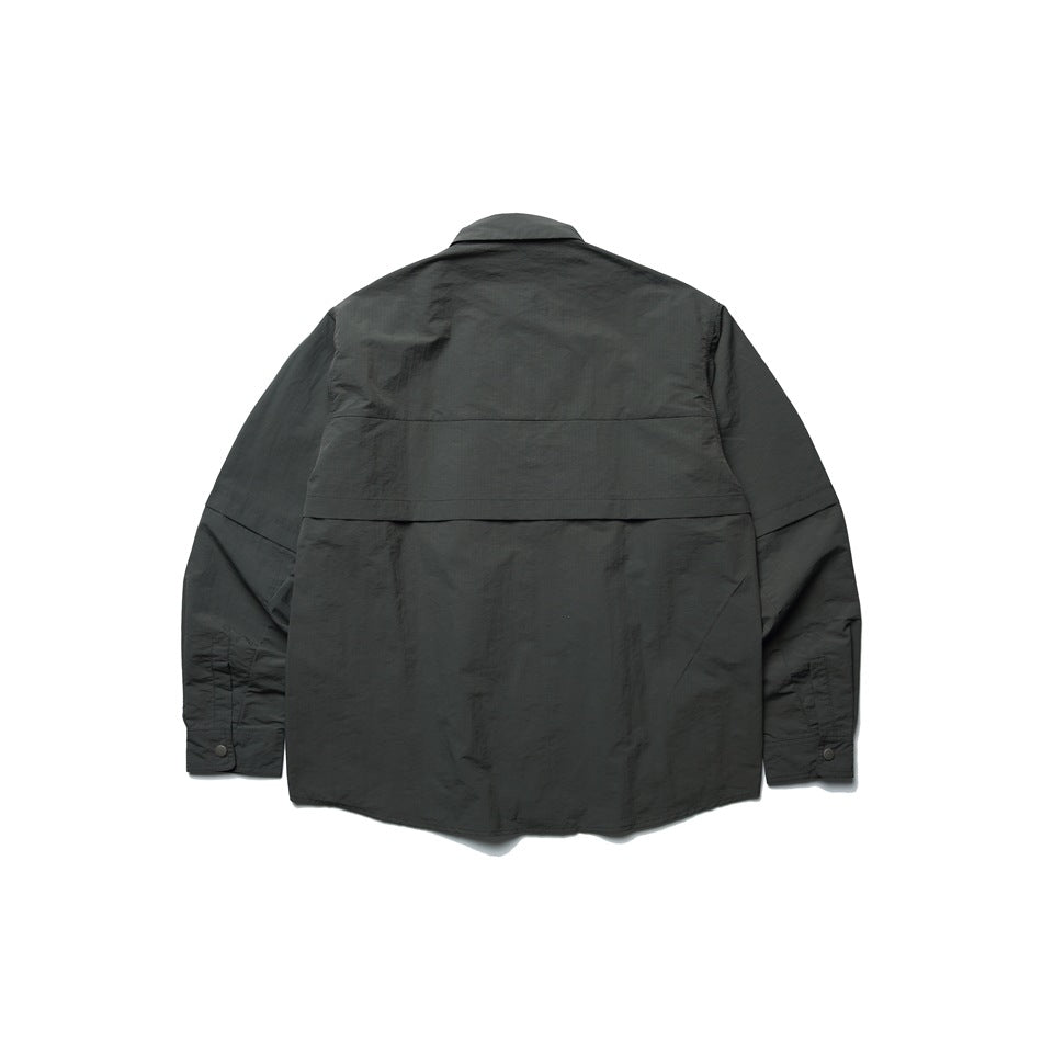 Back view of a dark charcoal long-sleeve shirt jacket with a horizontal back yoke and buttoned cuffs.