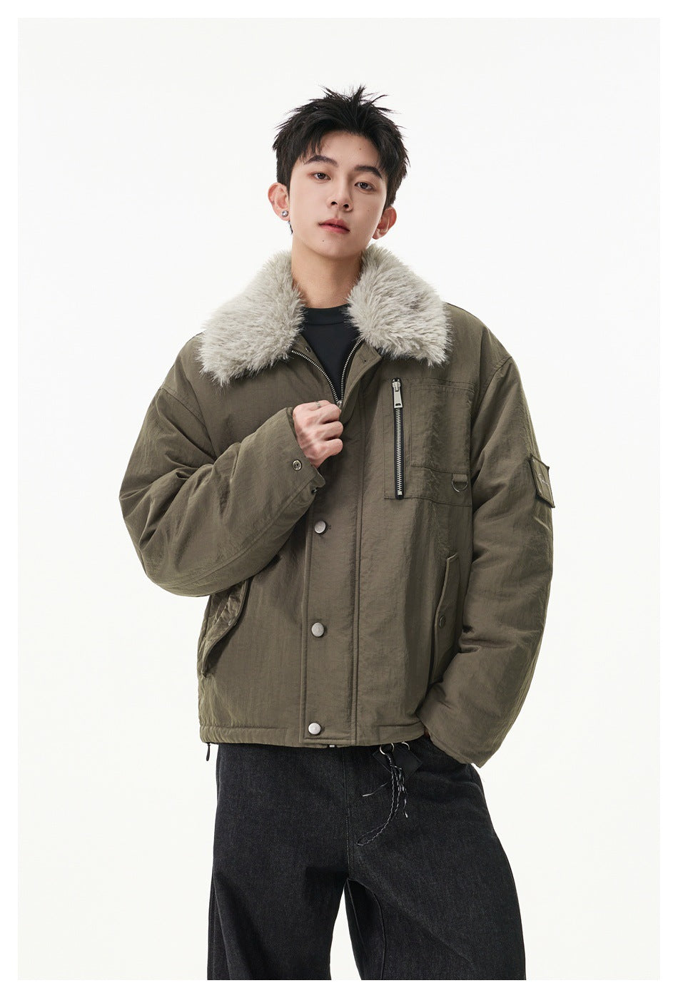 Model wearing an olive jacket with a plush light collar, snap front and zip chest pocket.