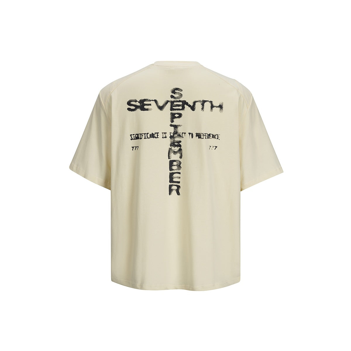 Back view of a cream short-sleeve T-shirt with a large distressed black text graphic.