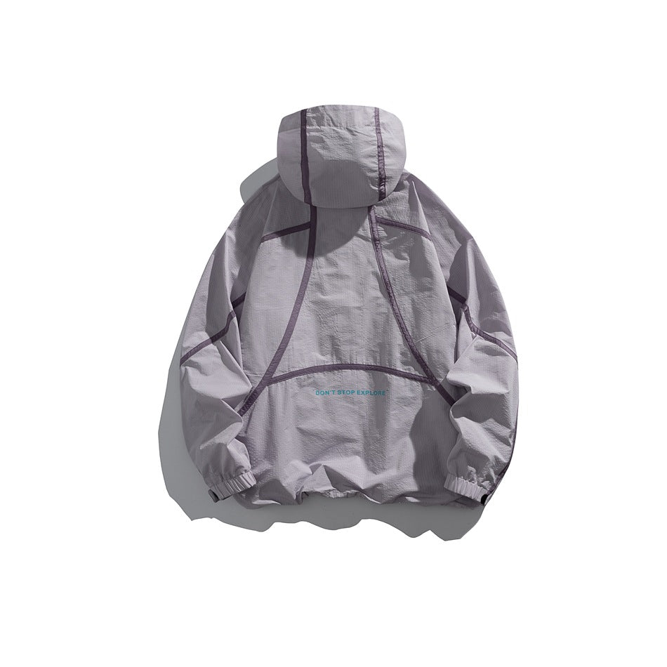 Pale lavender-gray hooded pullover jacket shown from the back, with dark seam detailing.
