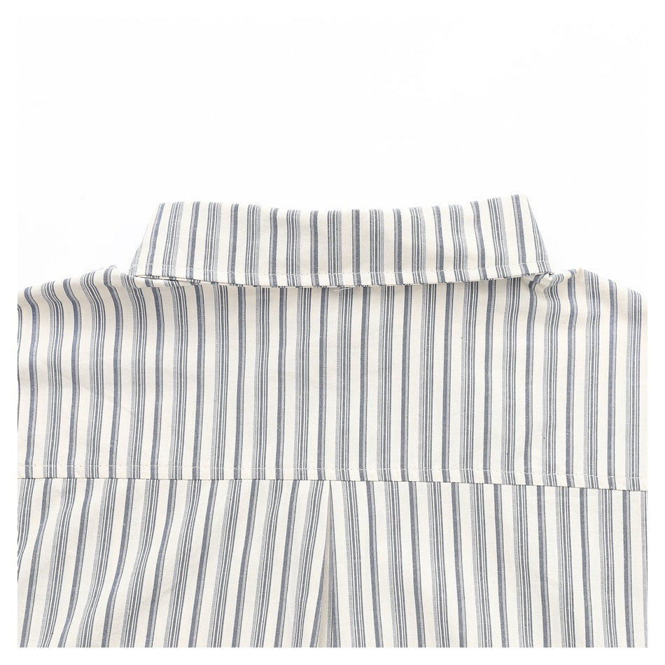 Close-up of a cream shirt with narrow blue-gray stripes, showing the collar and back yoke.