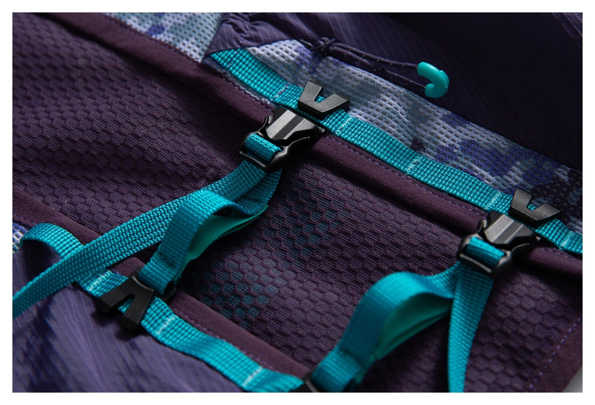 Close-up of turquoise webbing straps and black buckles across textured purple backpack panels.