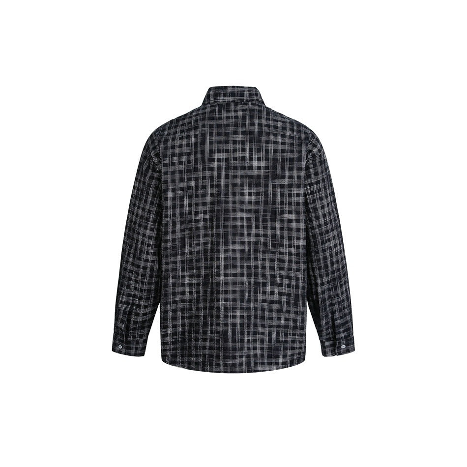Back view of a black long-sleeve button-up shirt with a gray plaid pattern and button cuffs.