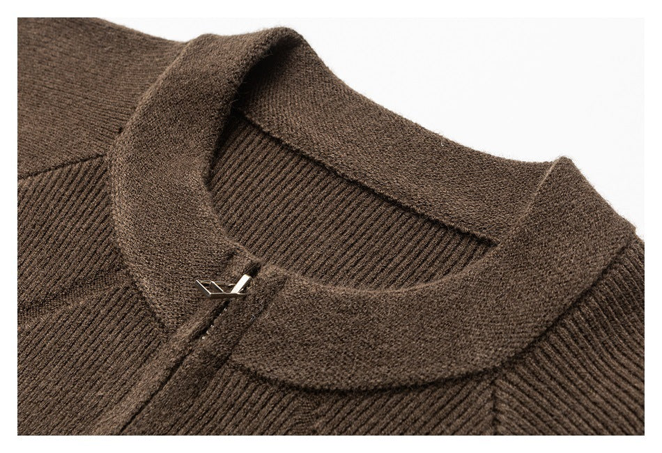 Close-up of a brown rib-knit garment collar with a small silver-tone clasp.