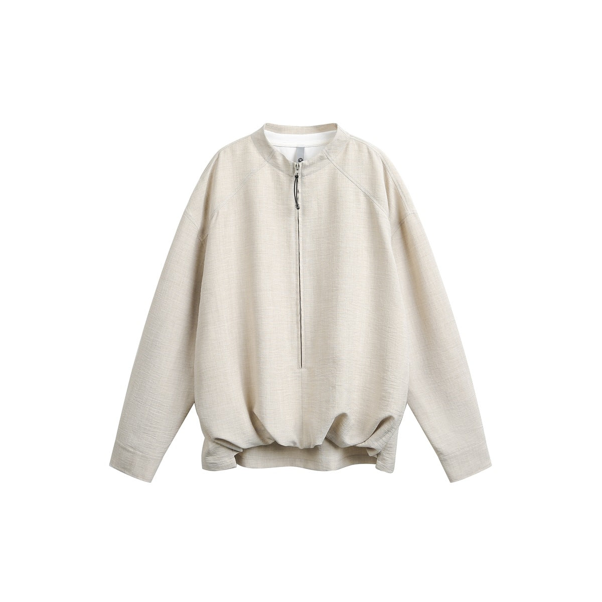 Front view of a light beige pullover with a short zip neckline, raglan sleeves and a gathered hem.