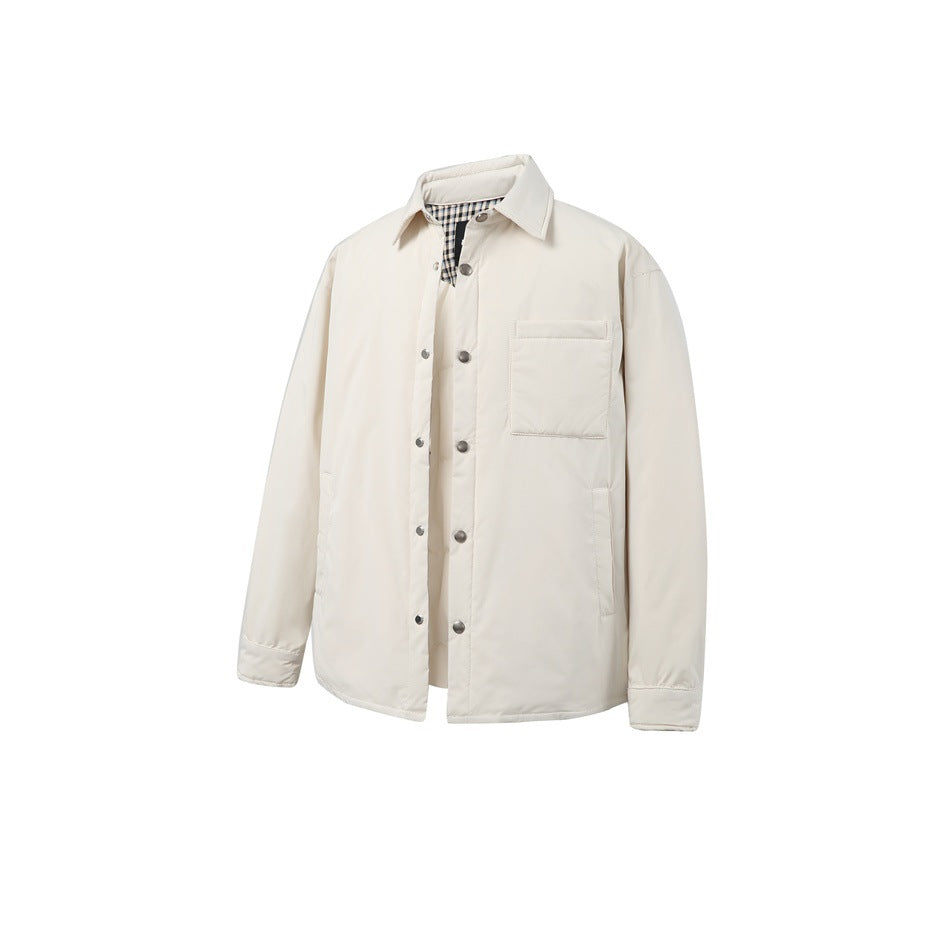 Beige quilted shirt-style jacket with snap buttons, chest pocket and gingham lining at the collar, front three-quarter view