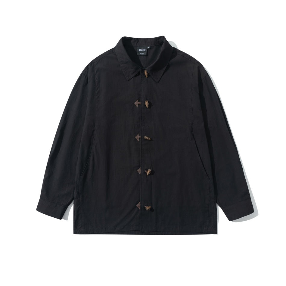 Black long-sleeve collared shirt with five brown toggle buttons down the front, flat lay
