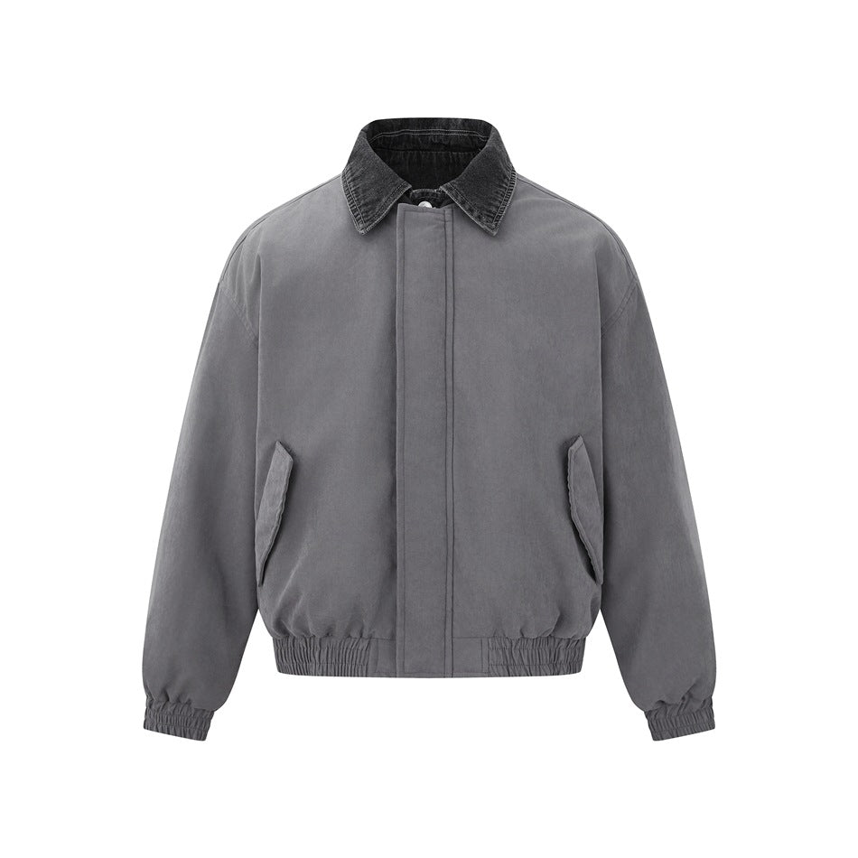 Gray bomber-style jacket front view with dark washed denim-look collar, concealed placket, flap pockets and elastic hem