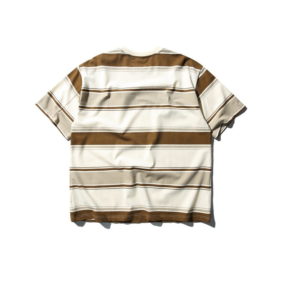Back view of a short-sleeve cream T-shirt with broad brown and taupe horizontal stripes.