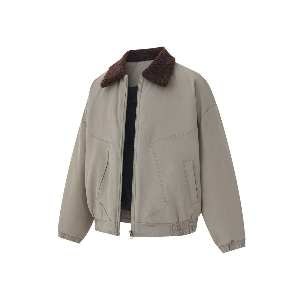 Front view of a taupe zip-front jacket with a dark brown textured collar, slanted pockets, and elasticized hem.