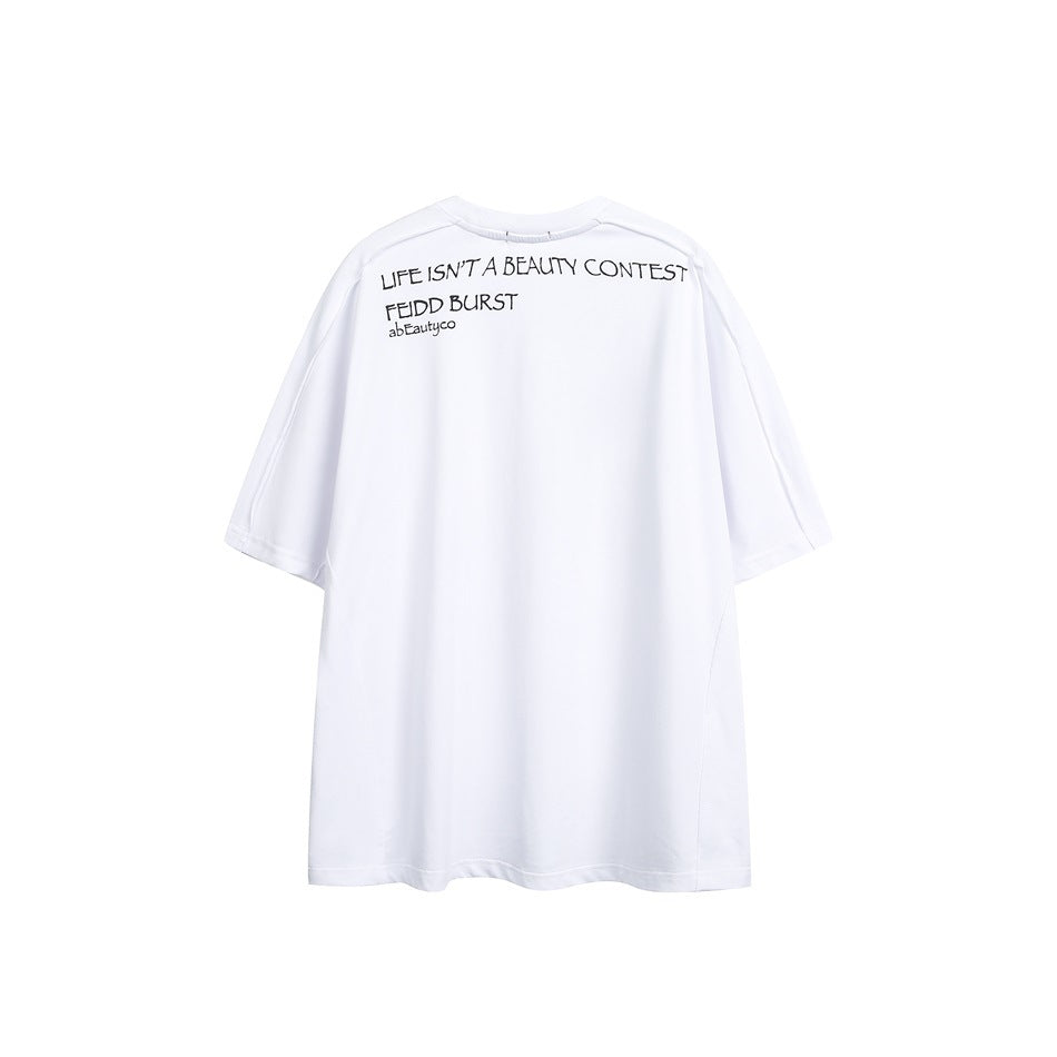 Back of a white oversized short-sleeve T-shirt with small black text printed across the upper back.