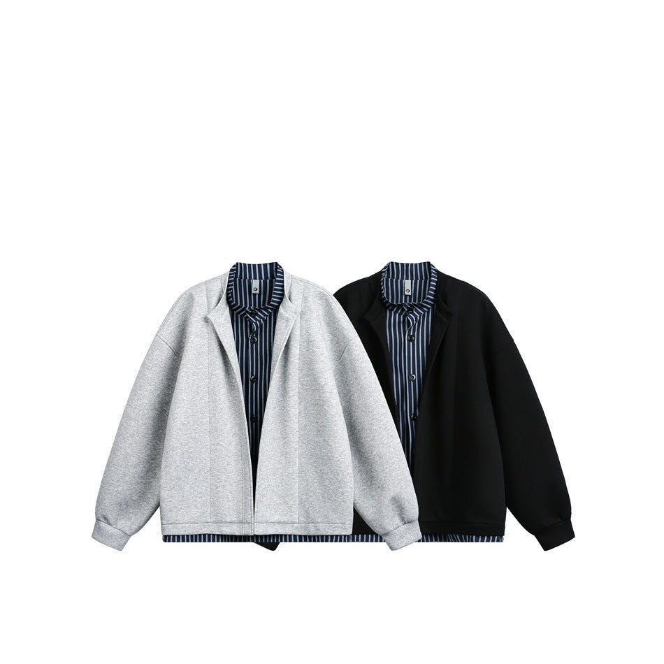 Light gray and black oversized jackets displayed together, each layered over a blue striped shirt.