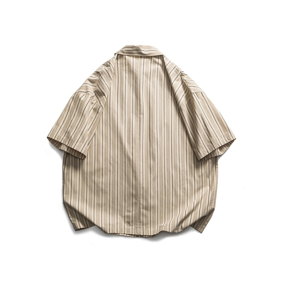 Back view of a beige short-sleeve button-up shirt with narrow vertical stripes, laid flat on white.