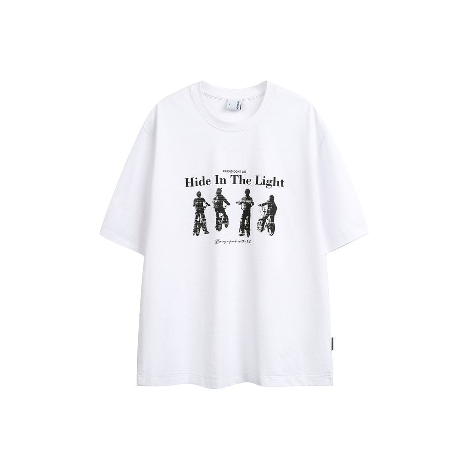 White short-sleeve crew-neck T-shirt with black graphic of four figures on bicycles and the text Hide In The Light