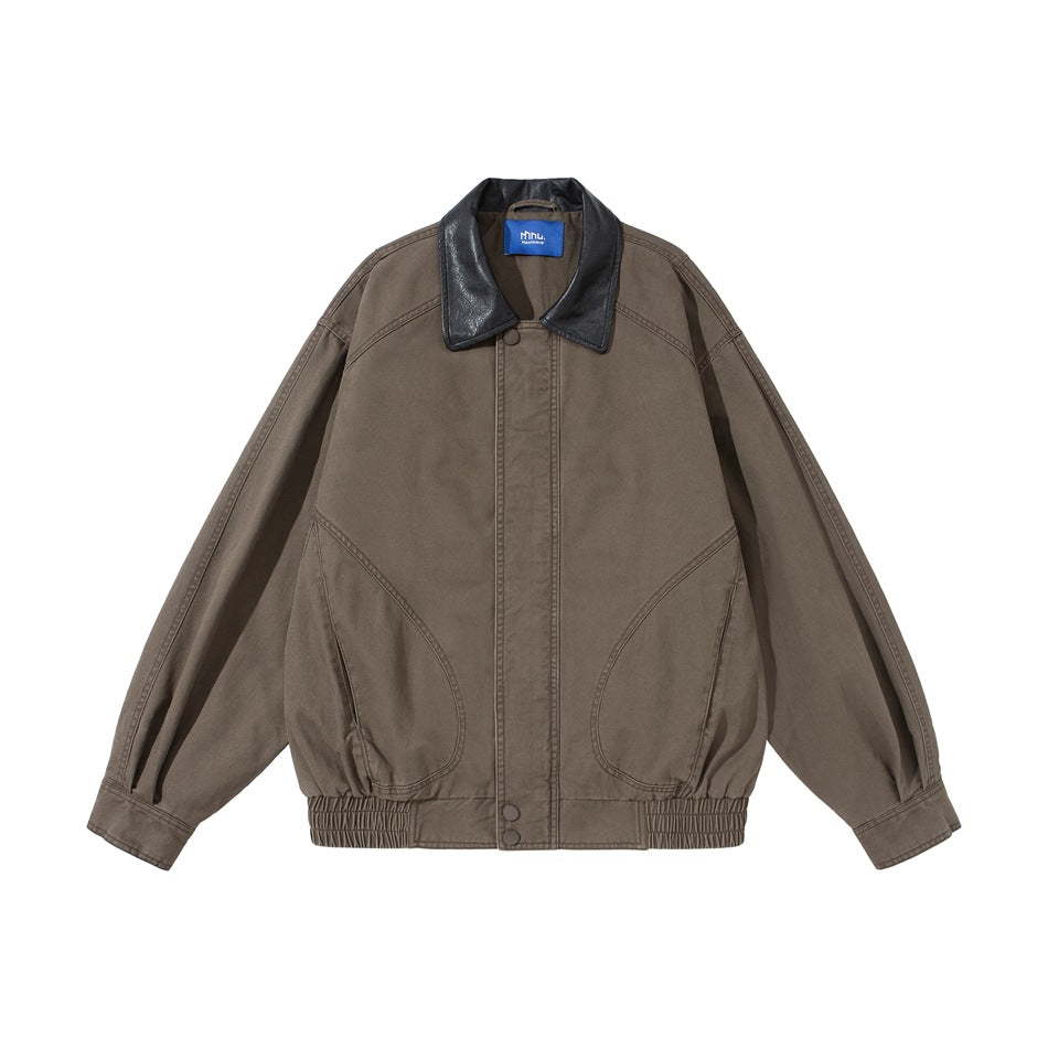 Khaki brown bomber-style jacket with black leather-look collar, curved seams and elastic hem, flat front view