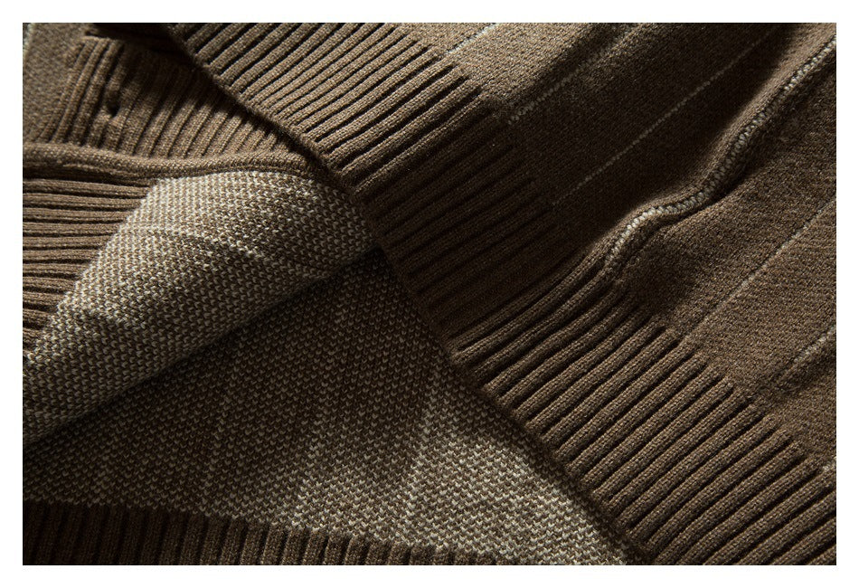Close-up of the brown striped knit cardigan's ribbed neckline and interior knit construction.