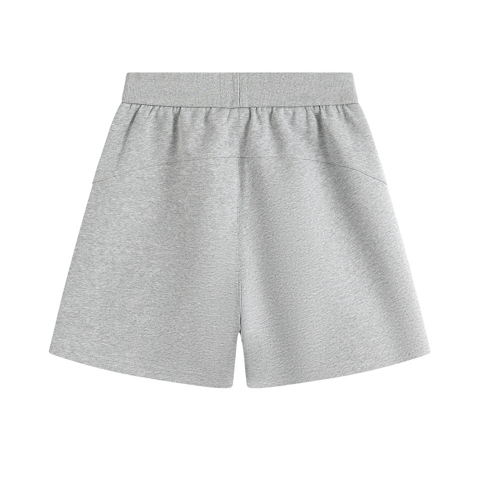 Back view of heather gray shorts with a wide ribbed waistband and curved yoke seam.