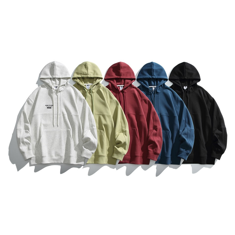 Five hooded sweatshirts arranged together in light gray, pale green, burgundy, blue, and black.