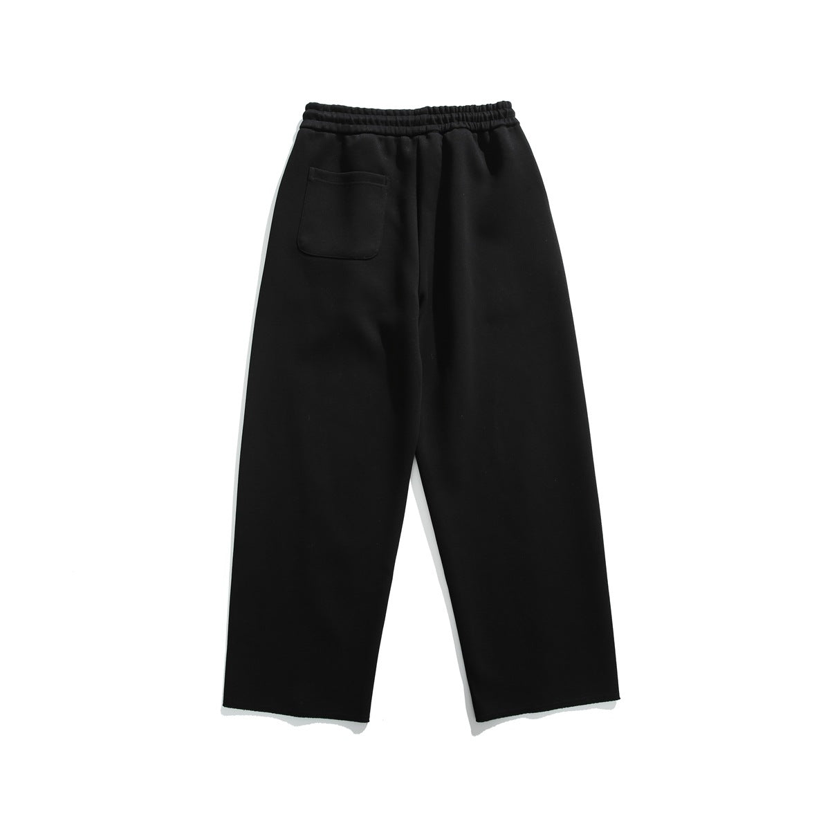 Back view of black wide-leg sweatpants with an elastic waistband and a patch pocket.