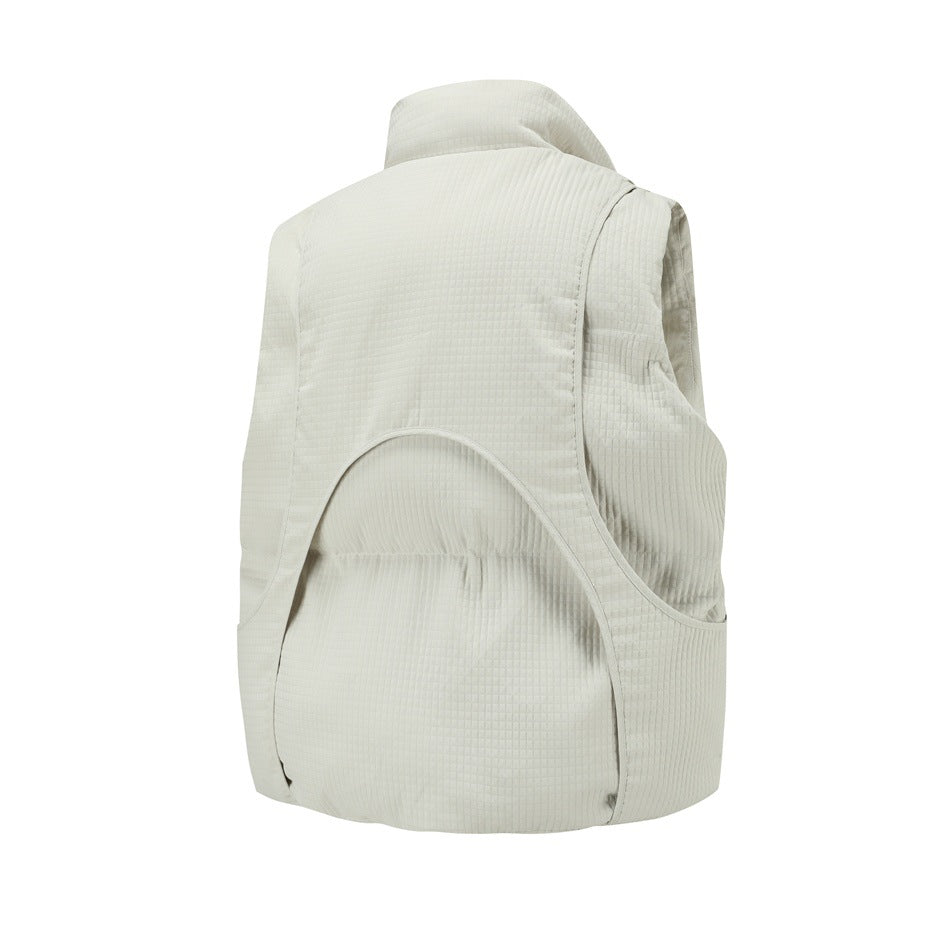 Back view of off-white waffle-textured puffer vest with curved seam panel and stand collar