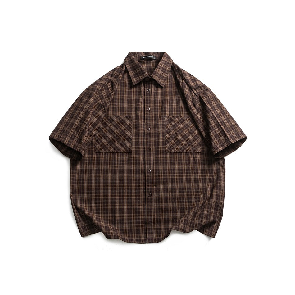 Coffee brown plaid short-sleeve button-up shirt with two chest patch pockets, flat lay front view