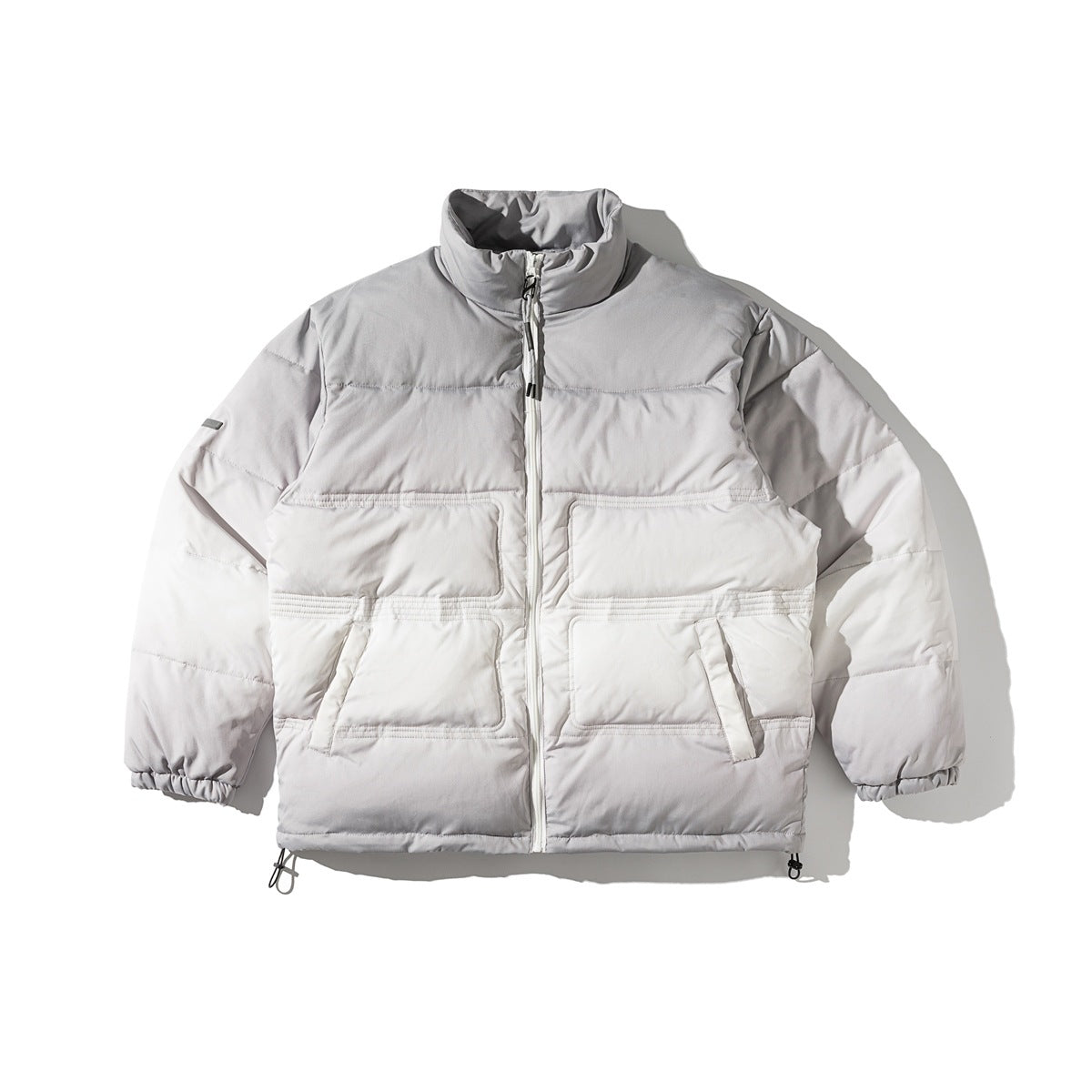 Gray-to-white gradient quilted stand-collar puffer jacket, front view with zipper, panel pockets and elastic cuffs