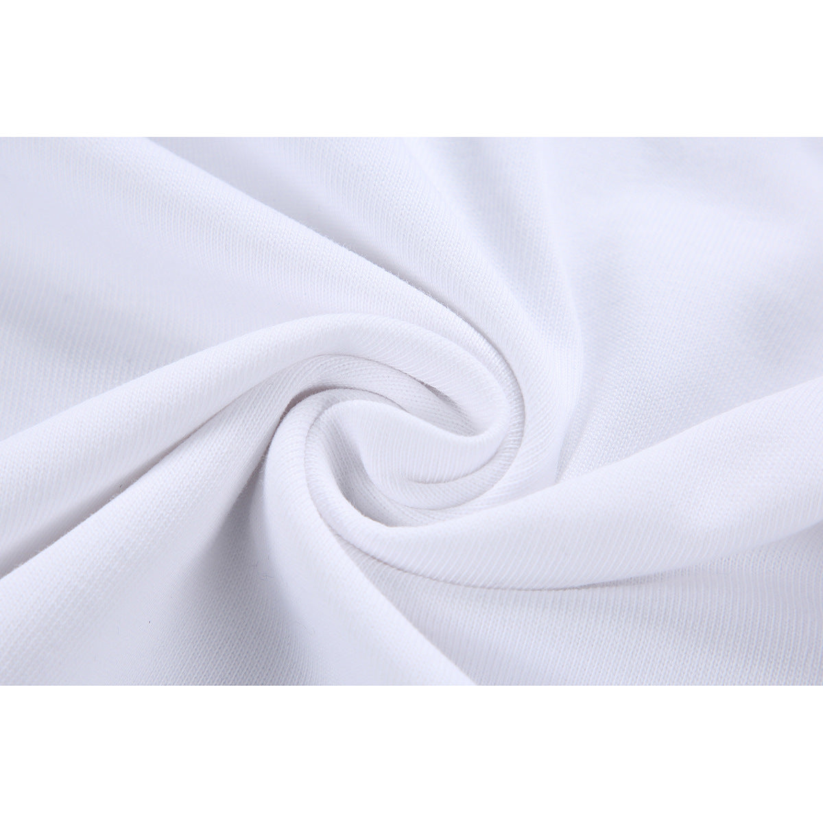 Close-up of white fabric gathered into a swirl to show its surface and texture.