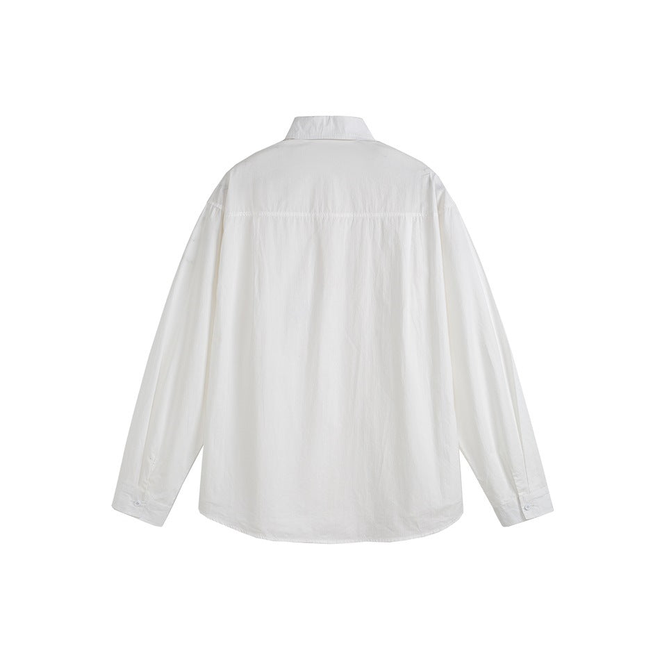 Back view of a white long-sleeved button-up shirt with a pointed collar and curved hem.