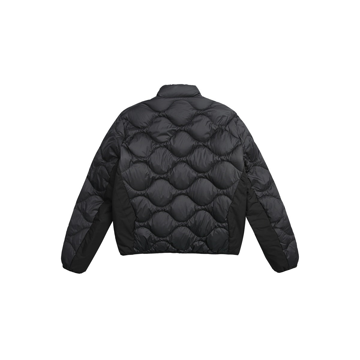 Back of a black jacket displayed flat against a white background, with wavy quilted stitching.