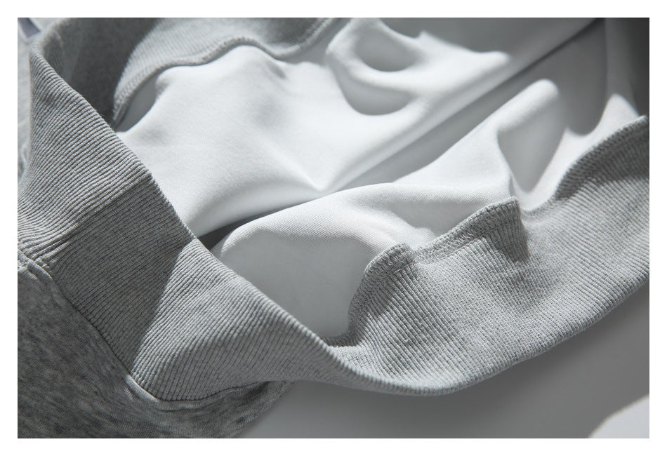 Close-up of the sweatshirt interior and gray ribbed edge.