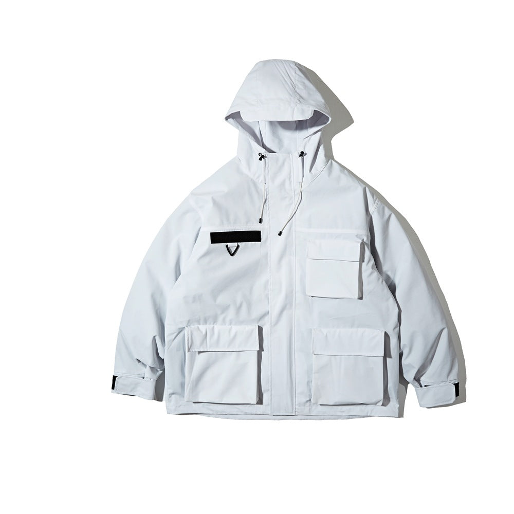 Snow white hooded jacket laid flat, front view with three flap pockets, chest patch and hood drawcords