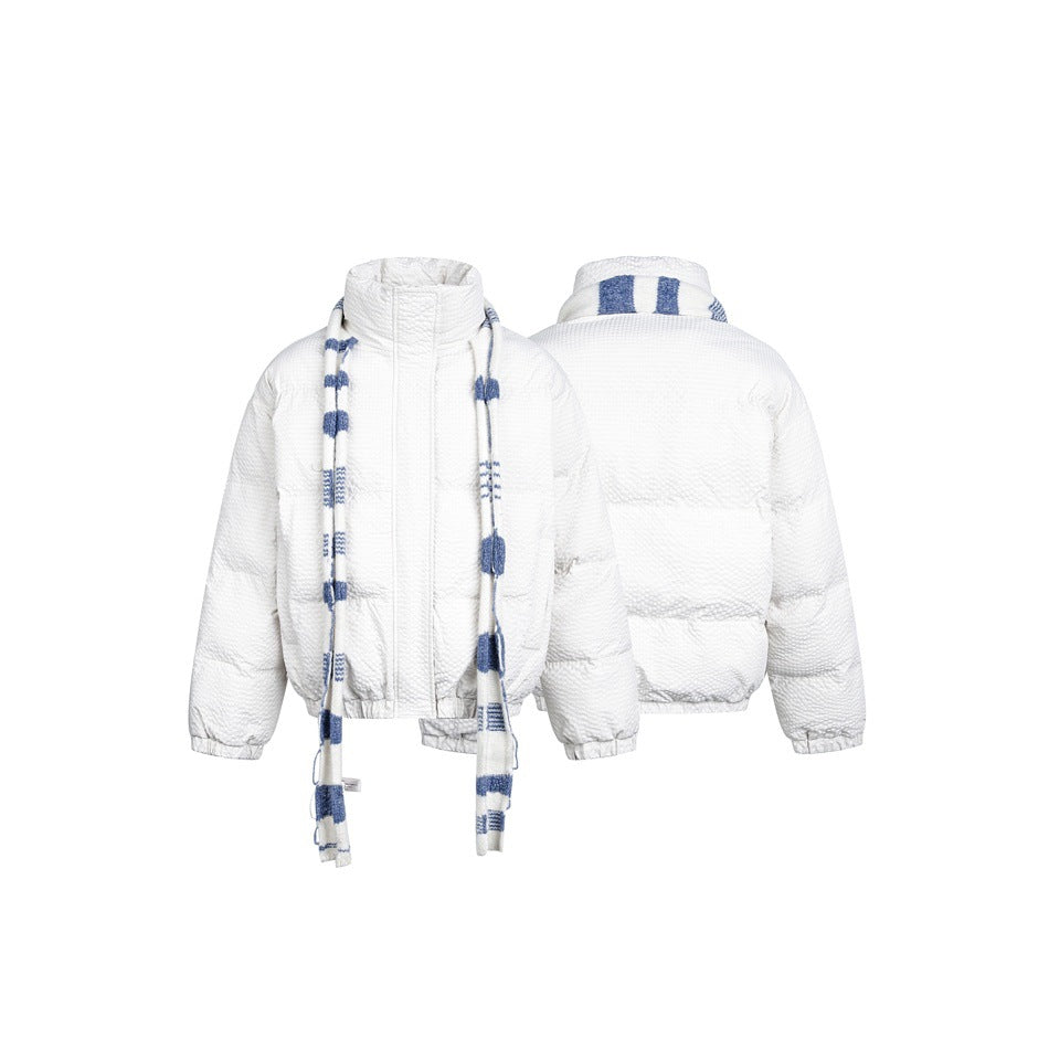 White quilted jacket shown from the front and back, styled with a long white scarf with blue stripes.