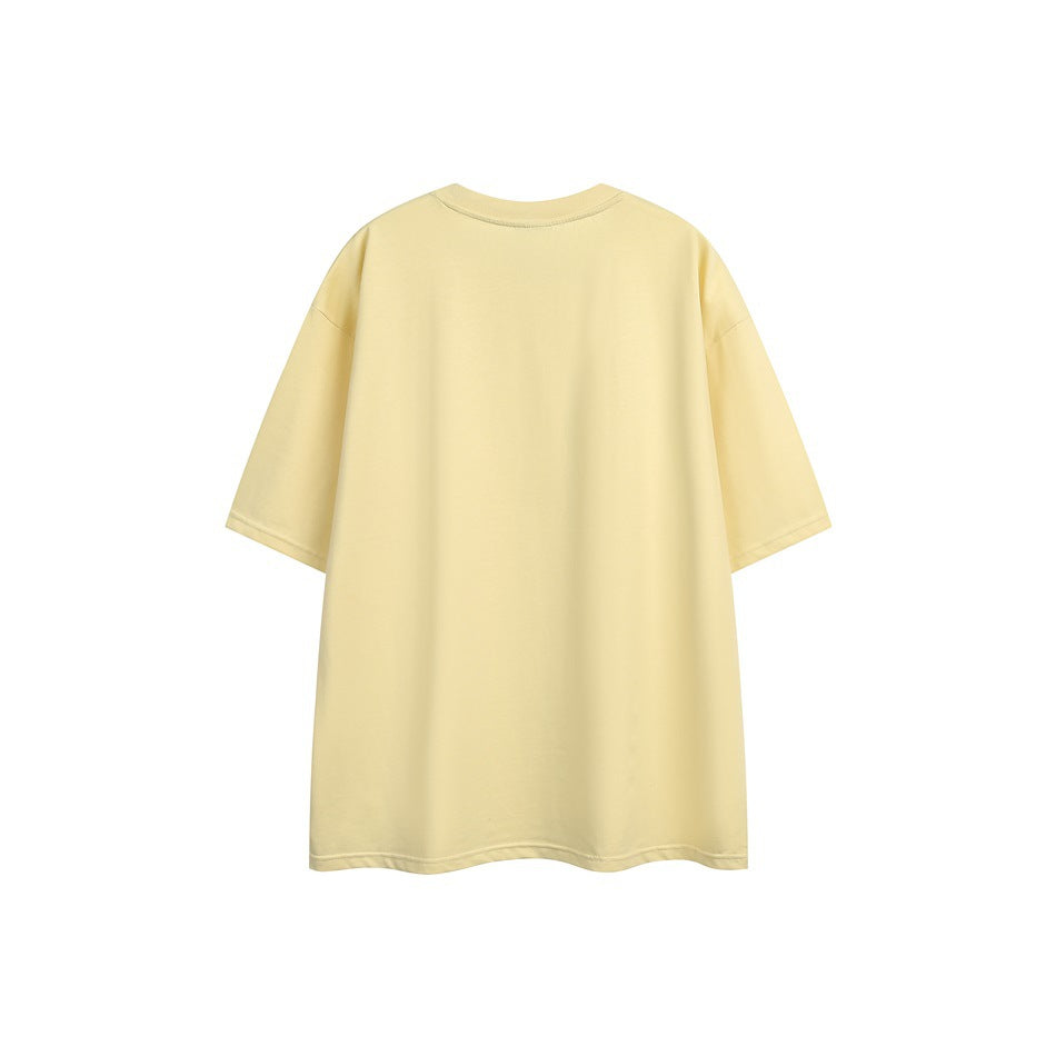 Back view of a plain pale yellow oversized short-sleeve T-shirt.