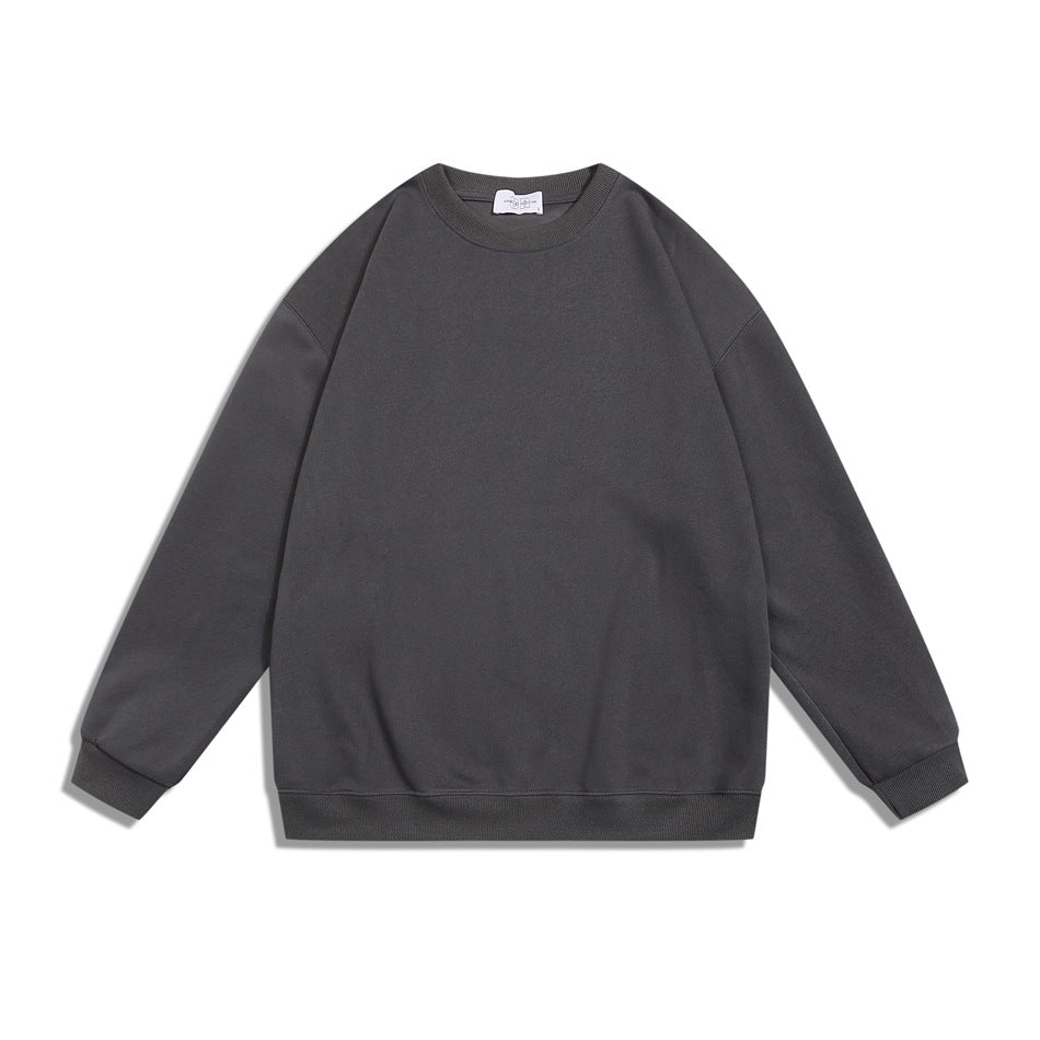Dark gray crew neck sweatshirt flat lay, front view, with ribbed collar, cuffs and hem
