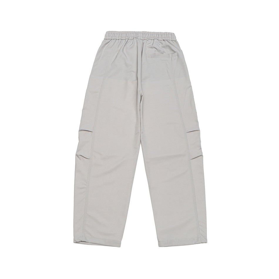 Back view of light gray wide-leg pants laid flat, showing an elastic waistband and a small rear pocket.