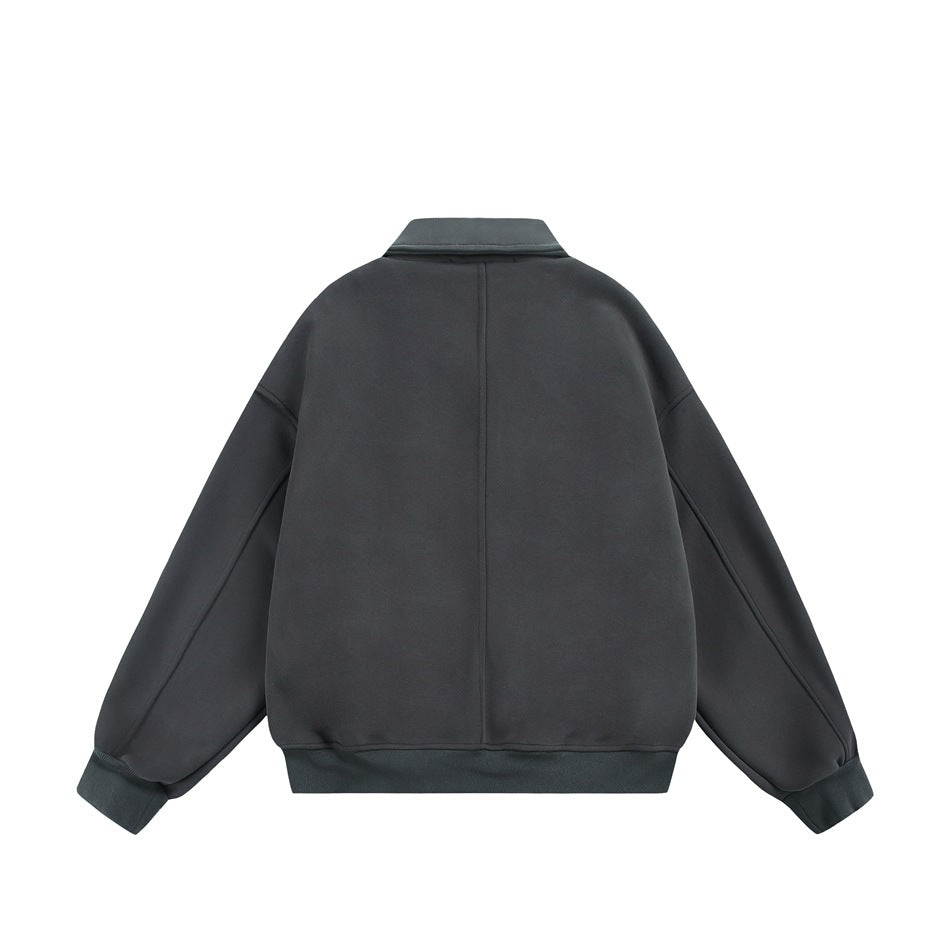 Back view of a dark gray jacket with collar, center back seam, ribbed cuffs and hem, flat lay