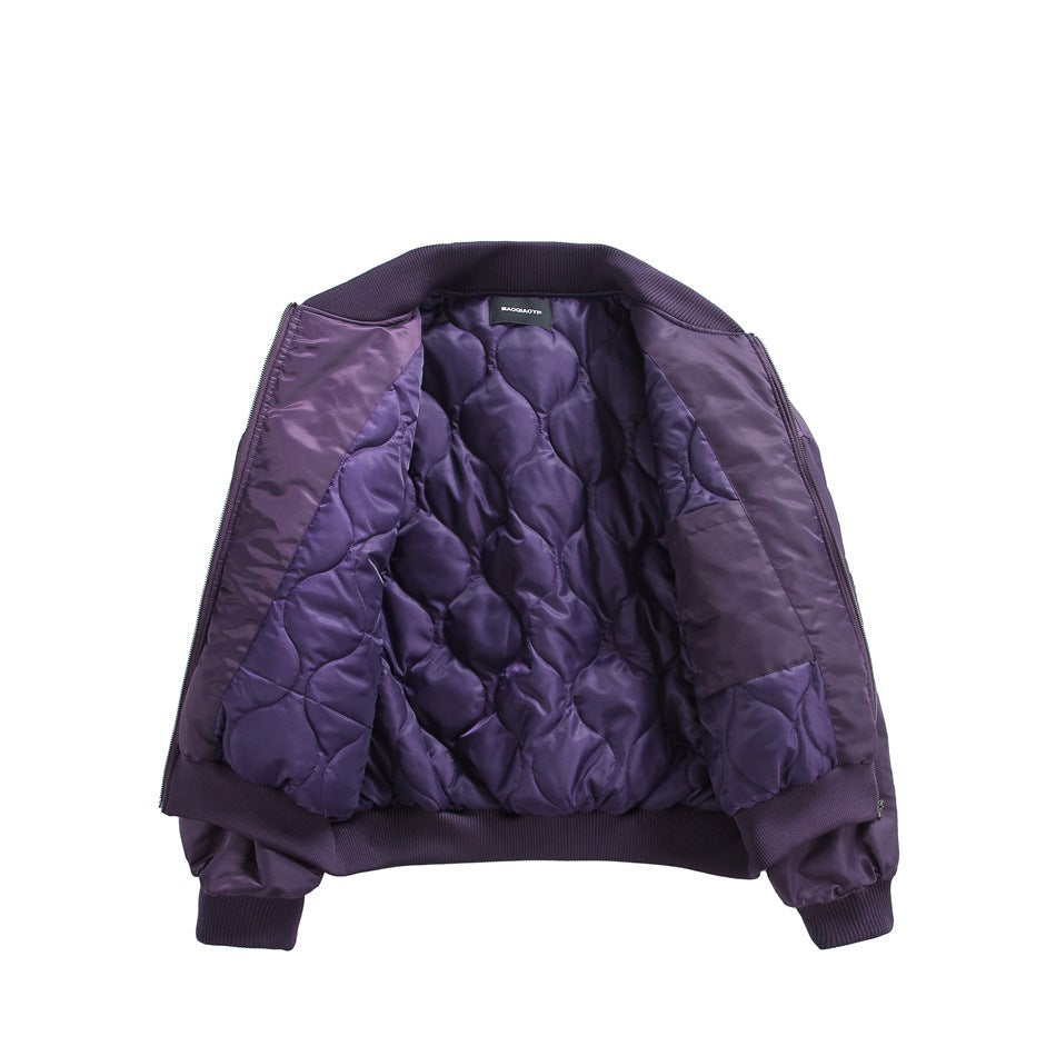 Purple bomber jacket opened to show its shiny quilted lining, zipper edges, and ribbed trim.