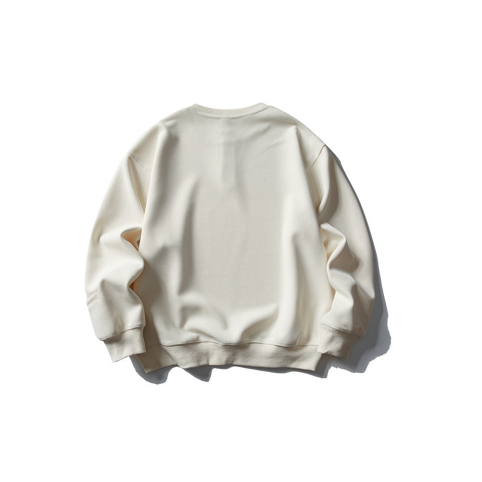 Back view of an ivory long-sleeve sweatshirt with a plain body and ribbed cuffs and hem.