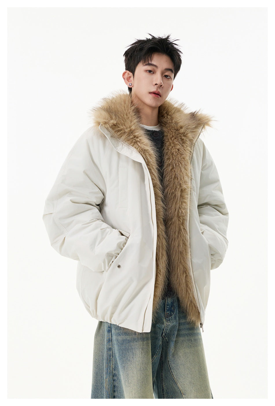 Model wearing an open ivory jacket with a wide tan faux-fur collar and roomy sleeves.