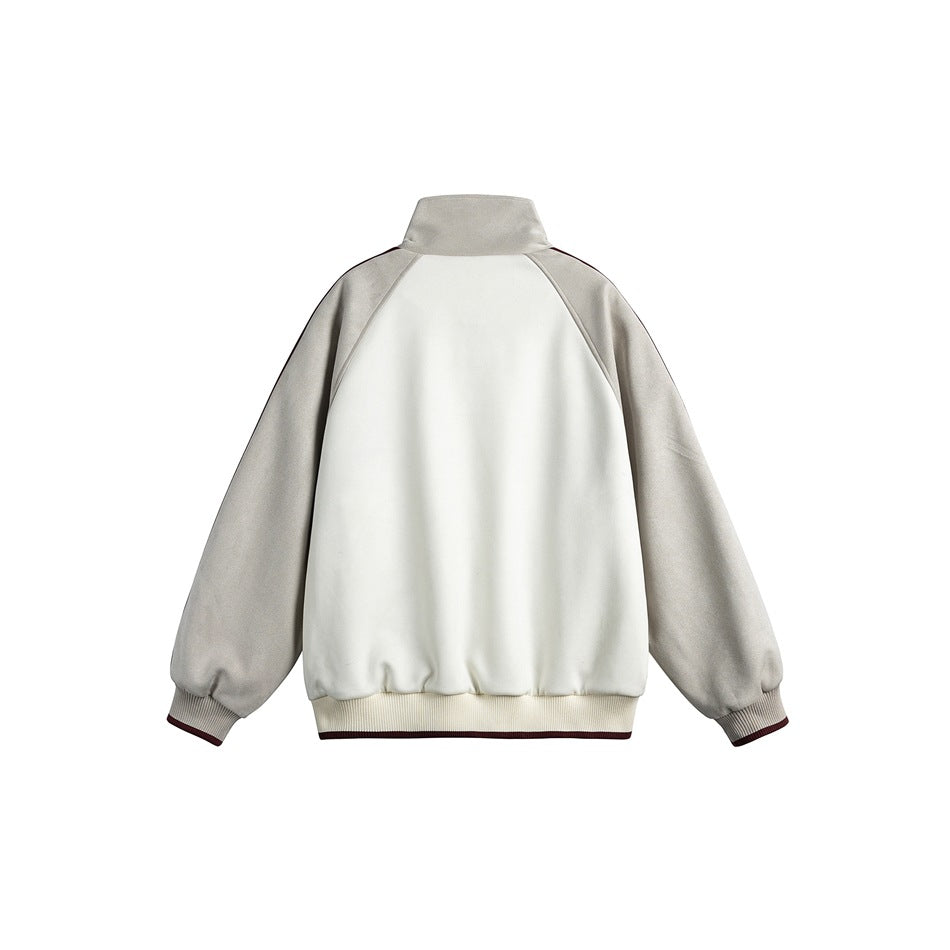 Back view of off-white jacket with light gray raglan sleeves, stand collar, ribbed cuffs and cream hem
