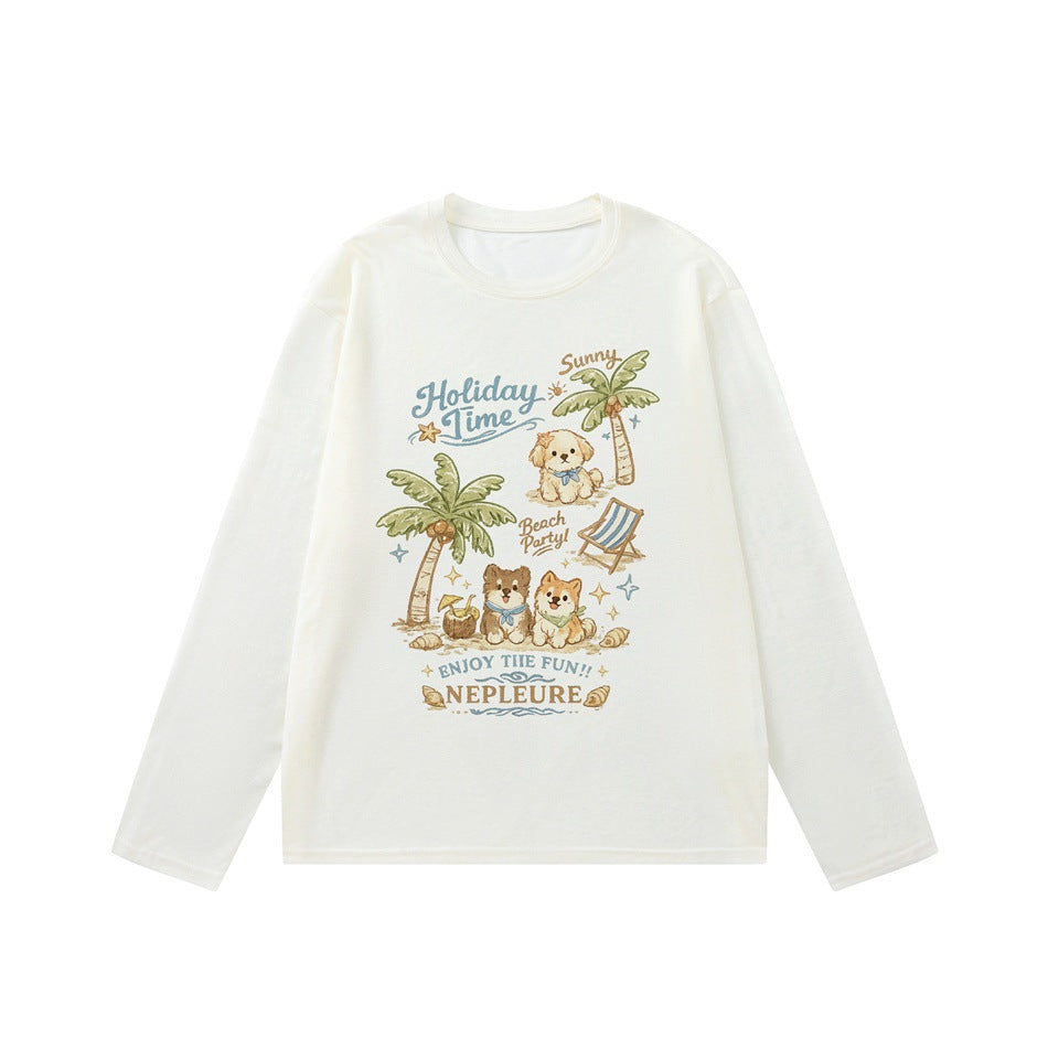 Off-white long-sleeve crew neck tee with beach puppies and palm trees graphic, flat lay front view