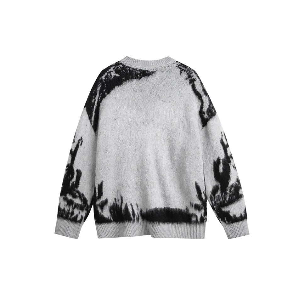 Light gray crewneck knit sweater with black plant-like graphic on shoulders, sleeves and hem, back view