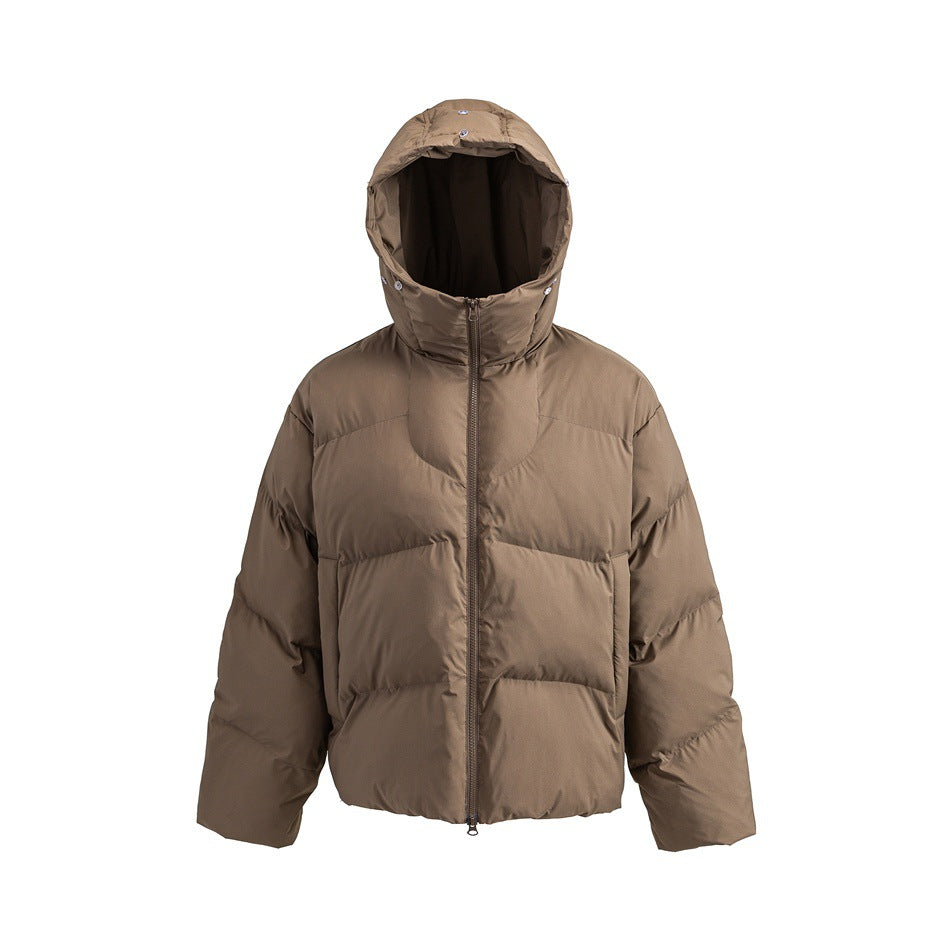 Brown quilted puffer jacket with hood up, snap fasteners and front zip, shown without fur trim