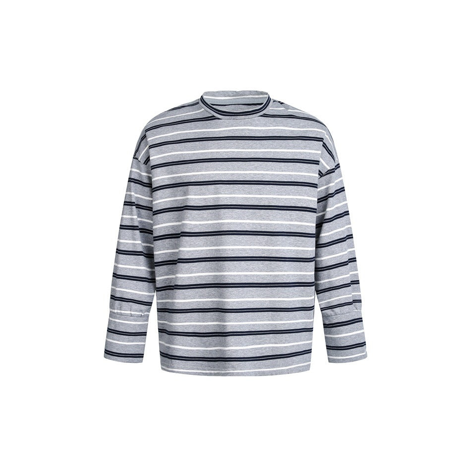 Gray long-sleeve top with navy and white horizontal stripes, flat front view with drop shoulders and a crew neck