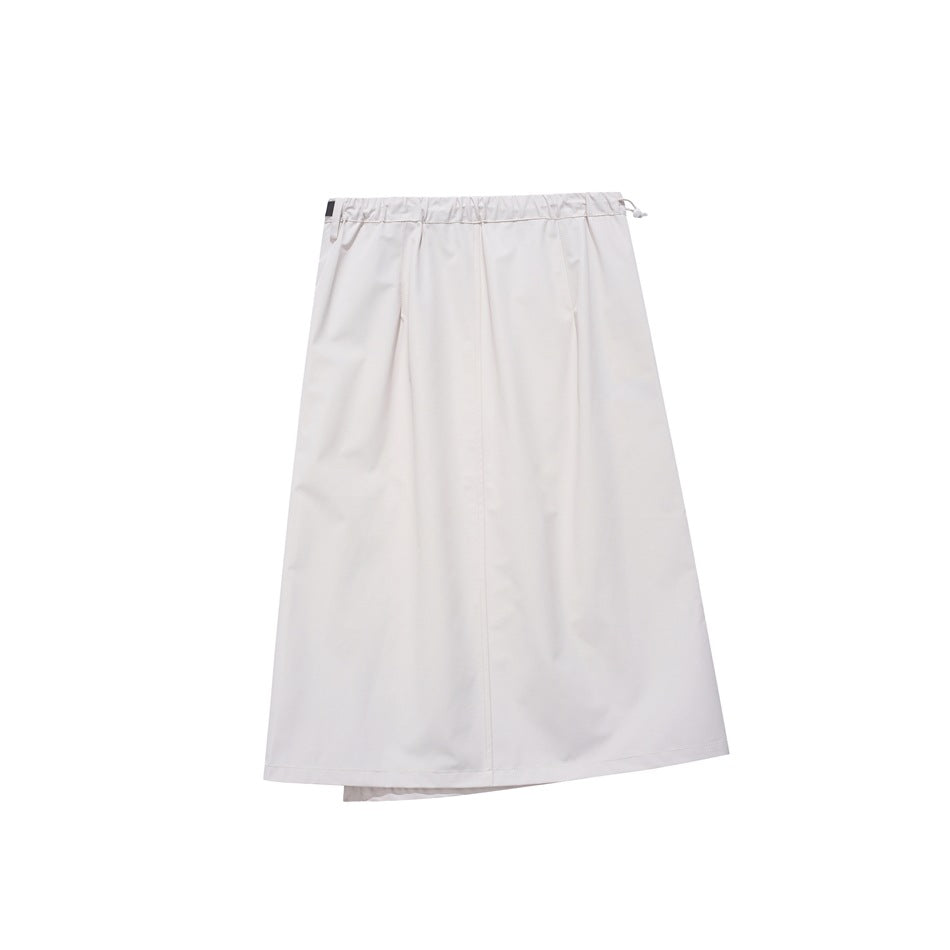 Off-white long A-line skirt laid flat, with a gathered drawcord waist and a straight front seam.