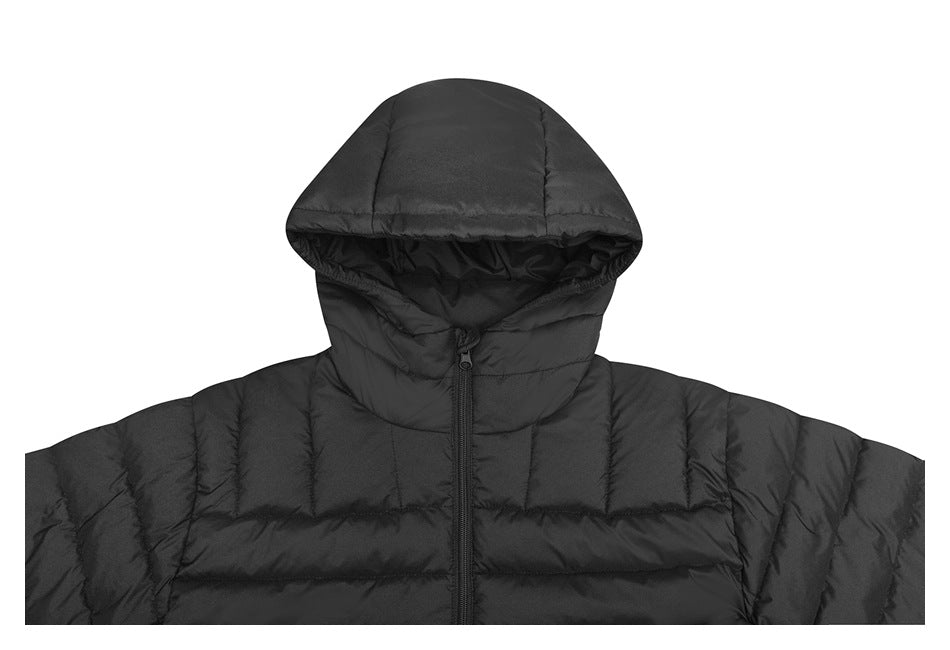 Close front view of a black quilted puffer jacket with a large hood and center zipper.