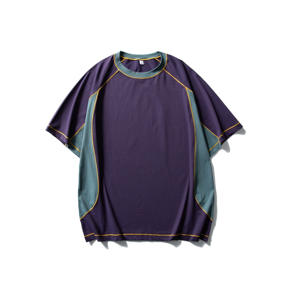 Purple short-sleeve T-shirt flat lay with teal side panels and neckband and yellow contrast topstitching
