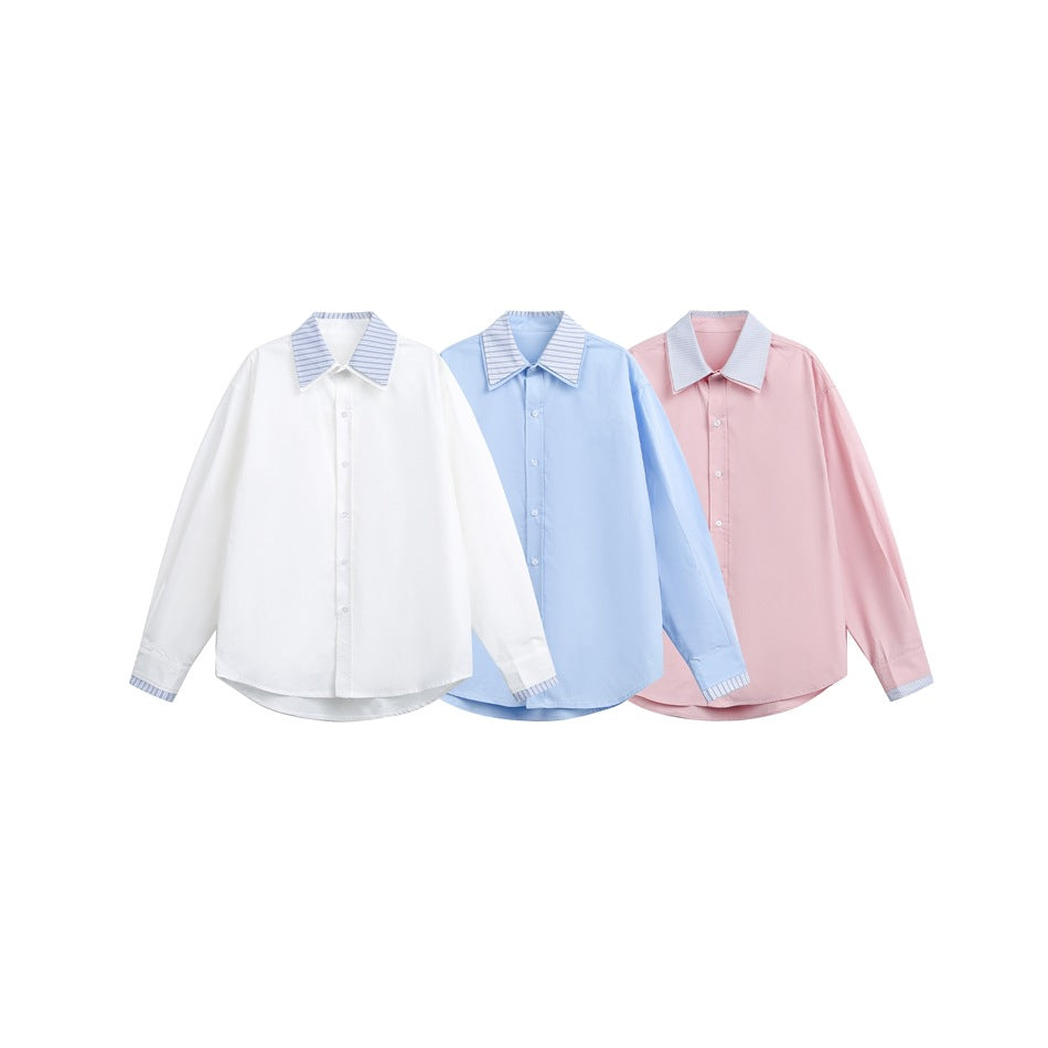 Three long-sleeve button-up shirts in white, light blue, and pink, with striped collars and cuffs.
